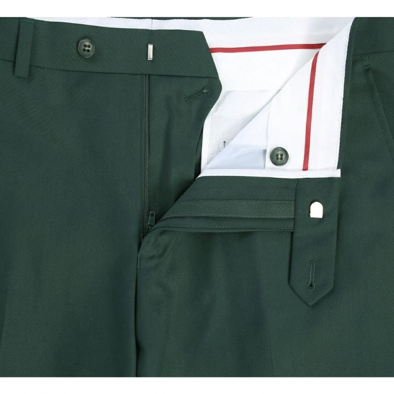 Close-up of dark green dress pants showing the waistband, button closure, zip fly, and a white inner lining with red piping.