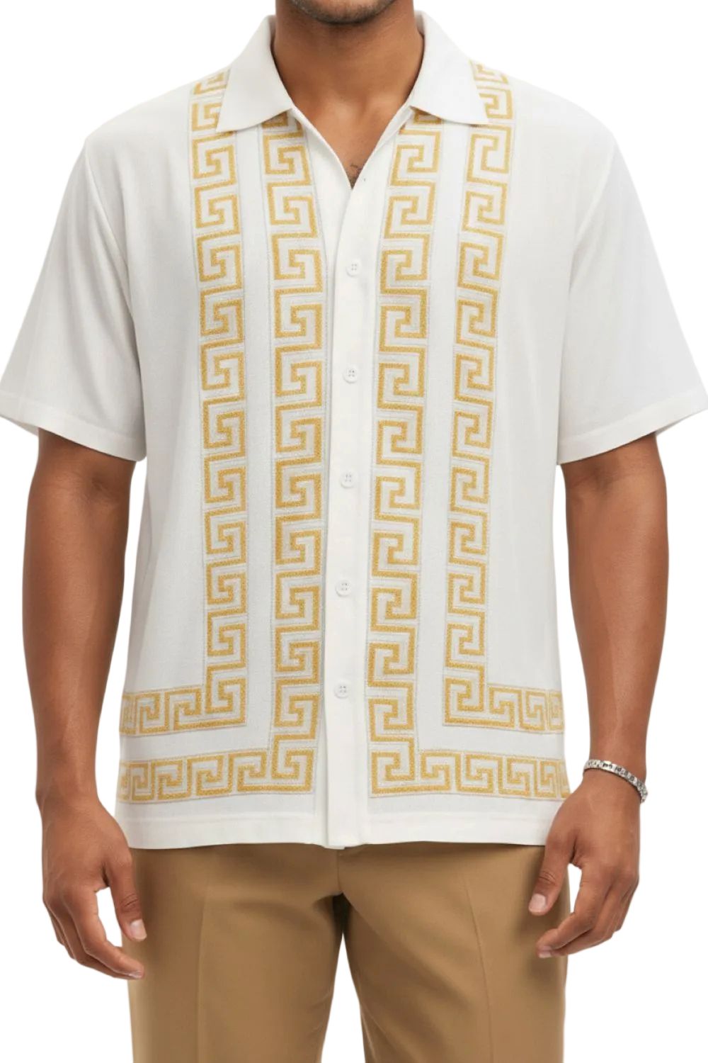 Man wearing a white shirt with gold geometric pattern and beige pants on a white background