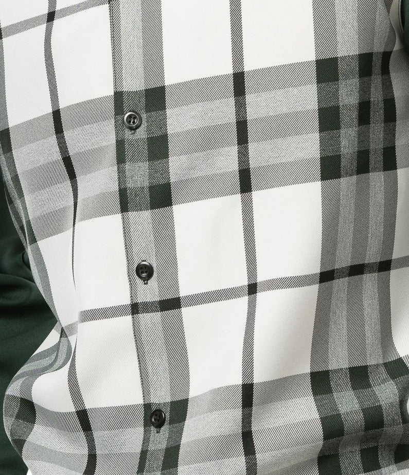 A checkered Green Plaid 2 Piece Long Sleeve Walking Suit Set shirt, highlighting the collar, buttons, and sleeves.