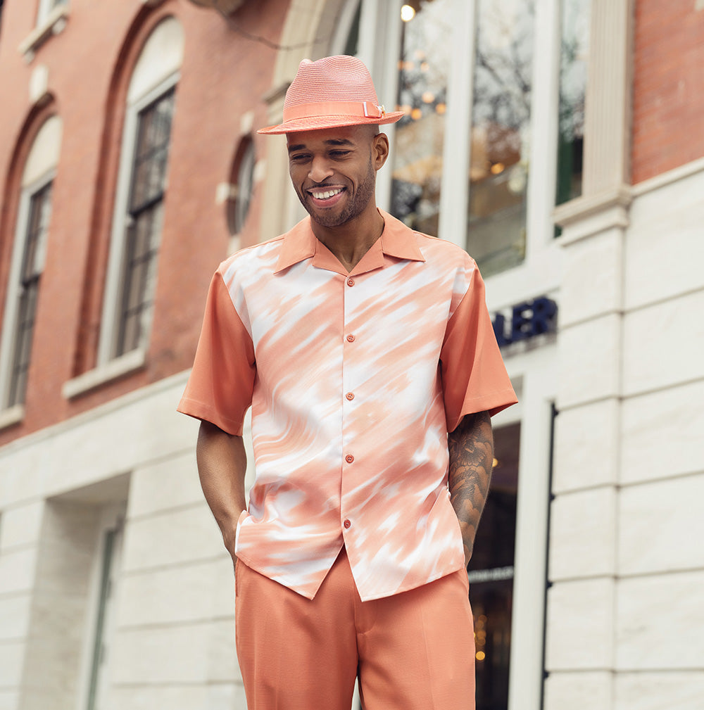 Close-up of the Apricot Abstract Print Walking Suit 2 Piece Short Sleeve Set top's short sleeve, showing buttons and collar.