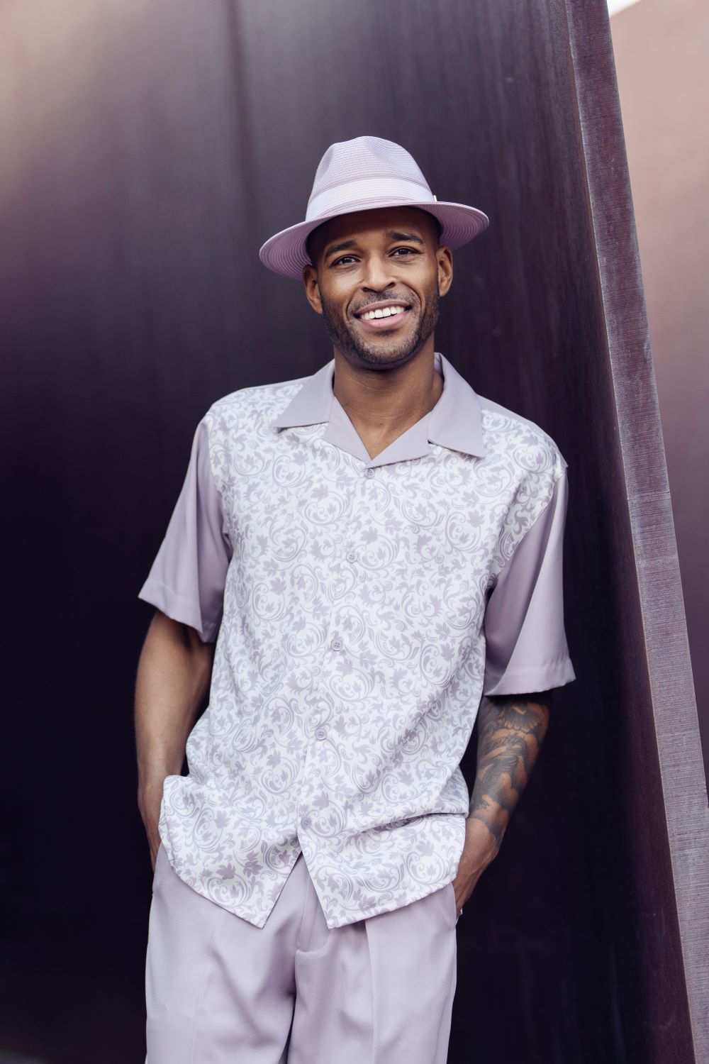 Close-up of the solid mauve sleeve on the Men's 2 Piece Mauve Floral Walking Suit jacket, showing cuff buttons.