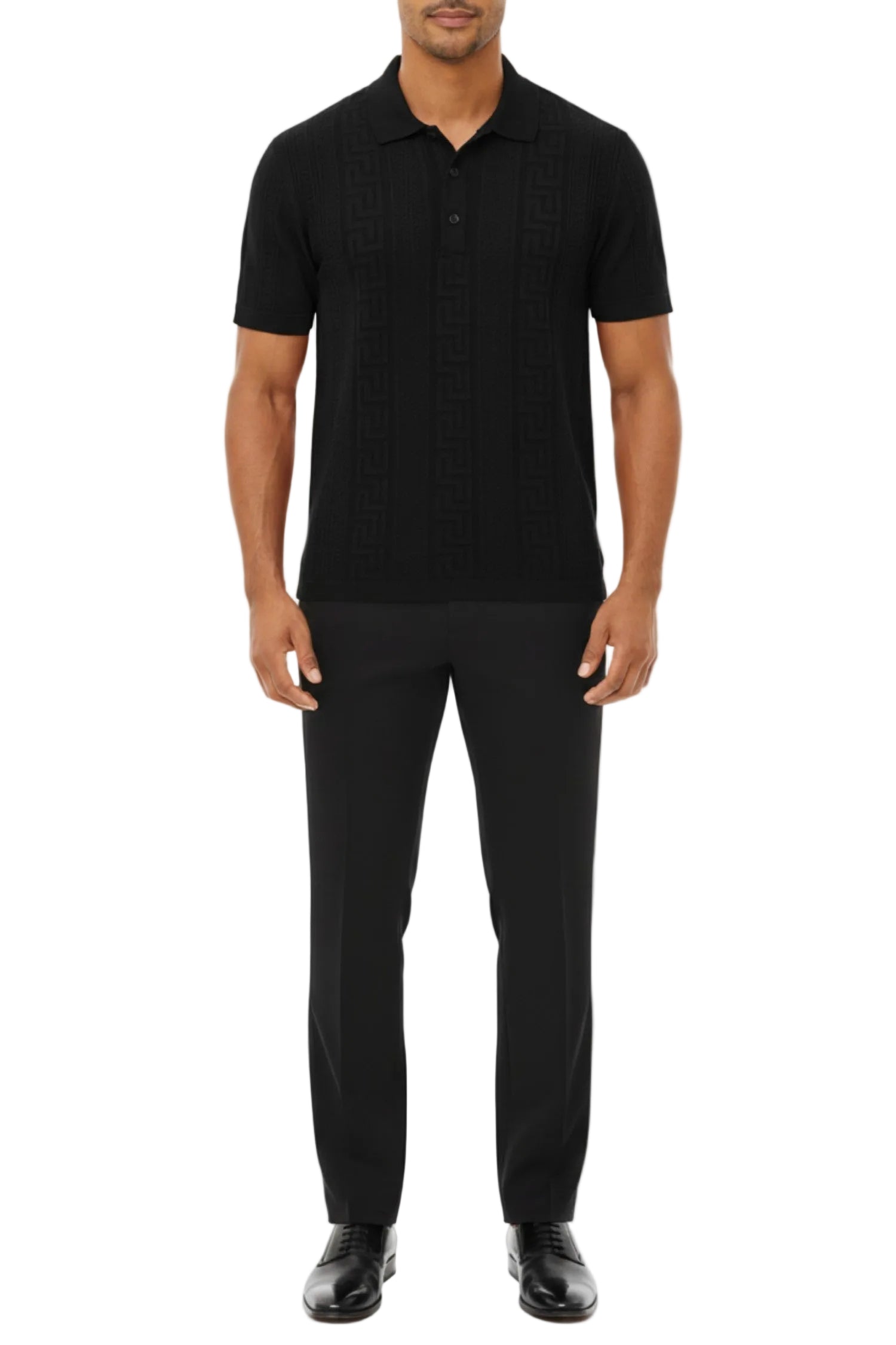 Man wearing a black polo shirt and black pants on a white background