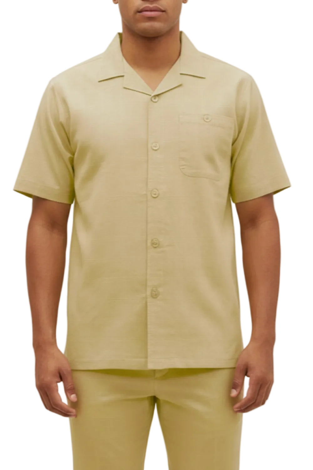 Man wearing a khaki short-sleeve button-up shirt and pants on a white background