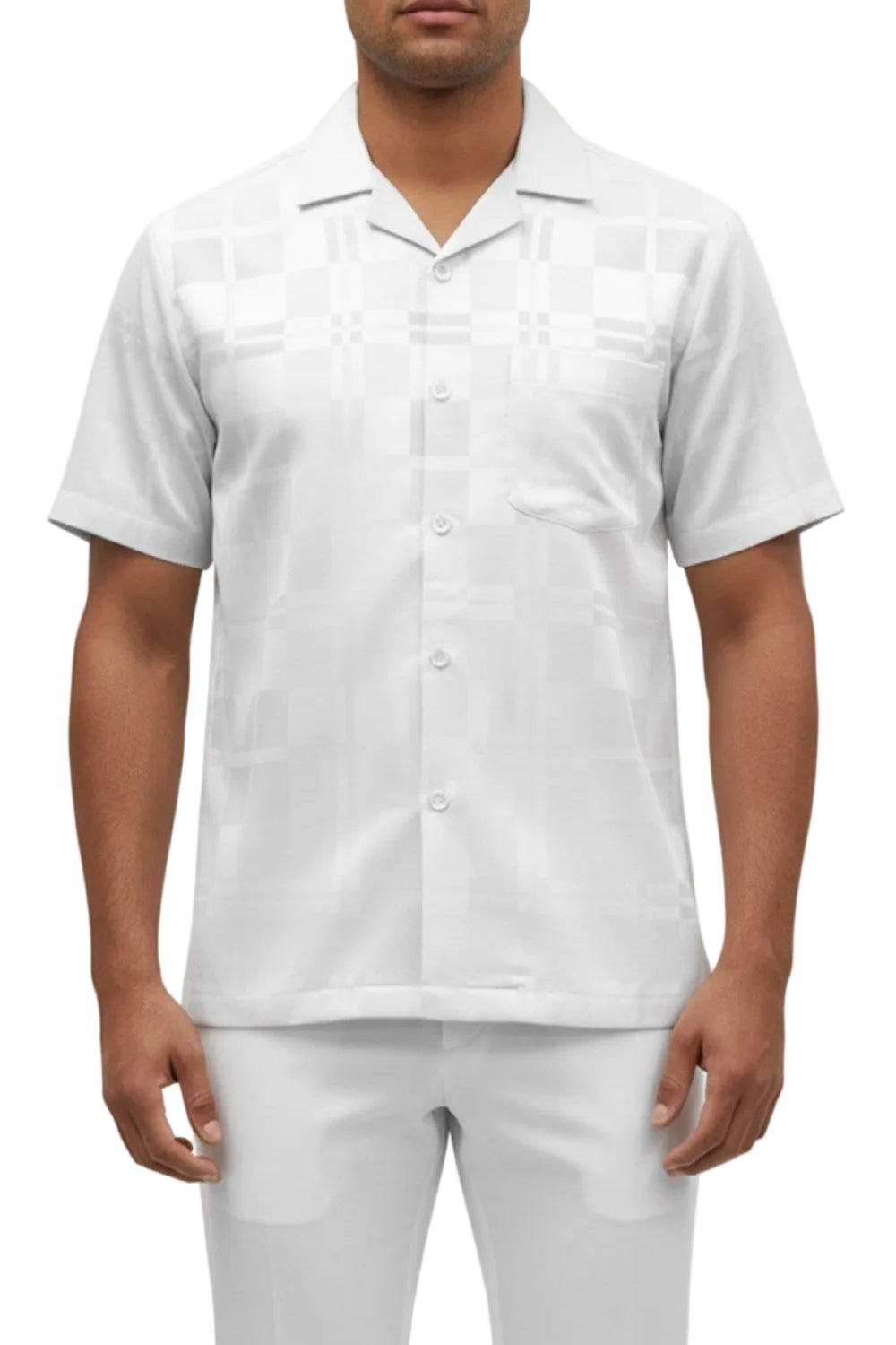 Man wearing a white short-sleeve button-up shirt and pants on a white background
