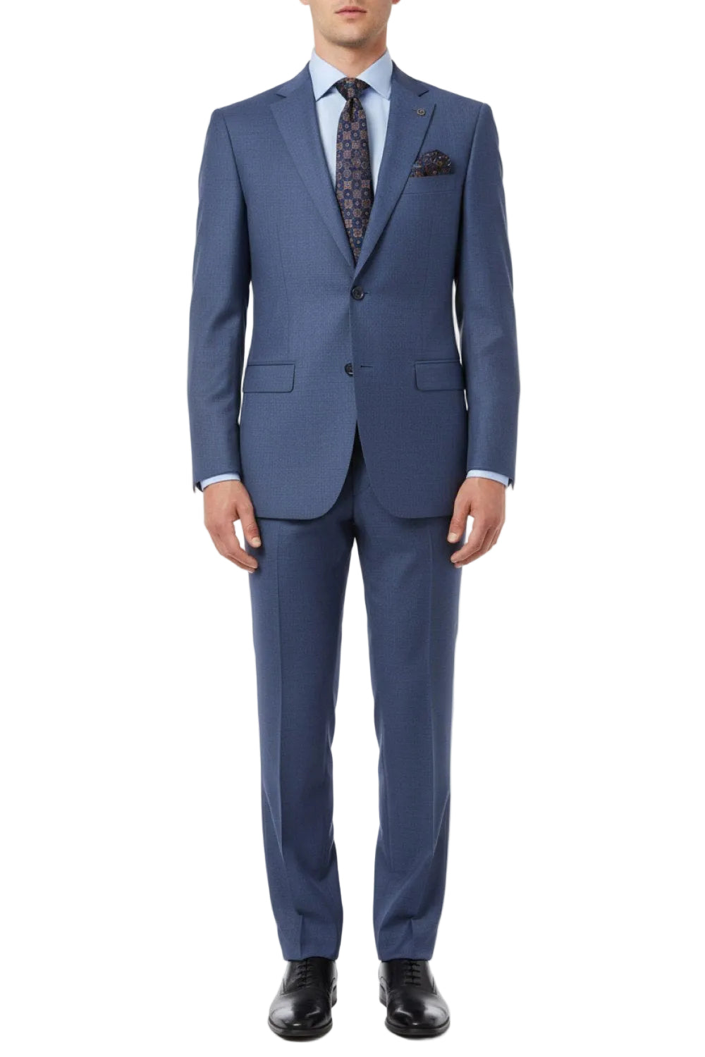 Blue suit with a patterned tie and pocket square on a white background
