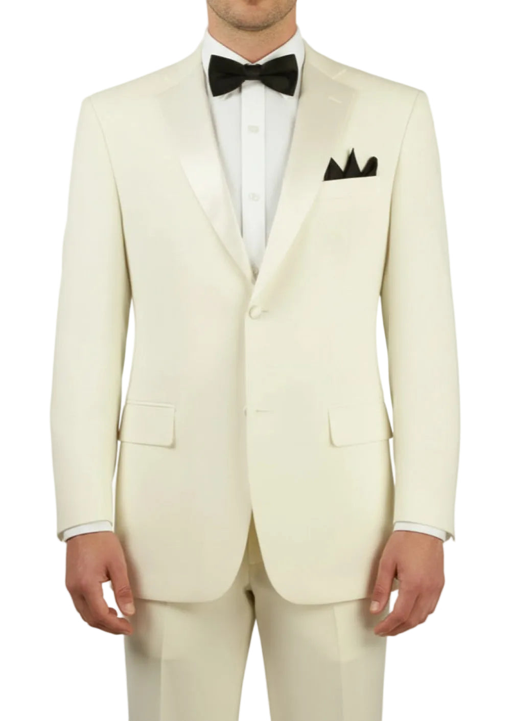 Man wearing a cream tuxedo with a black bow tie and pocket square on a white background