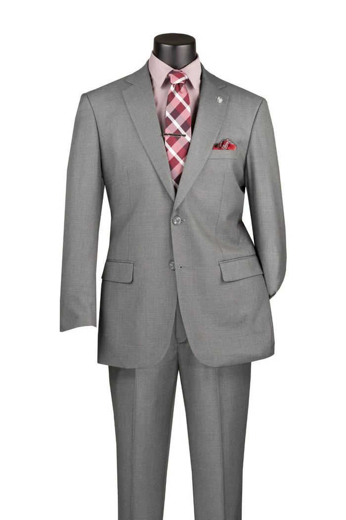 Gray suit with plaid tie and pocket square on a mannequin against a white background