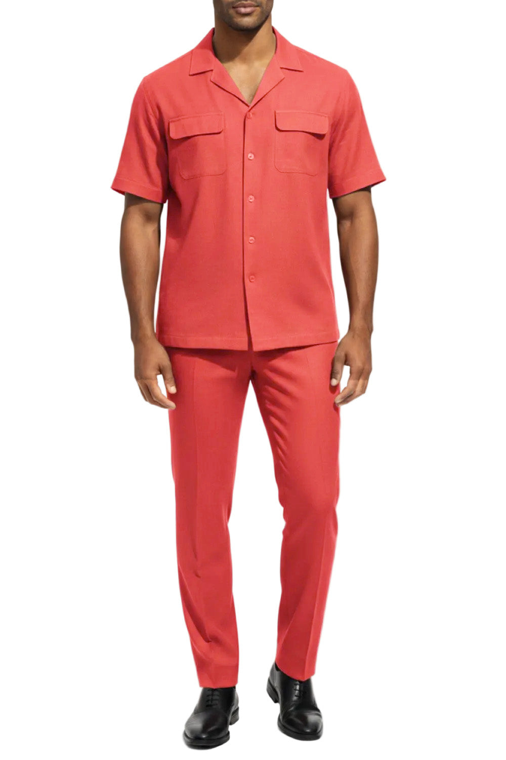 Person wearing an orange shirt and pants set on a white background