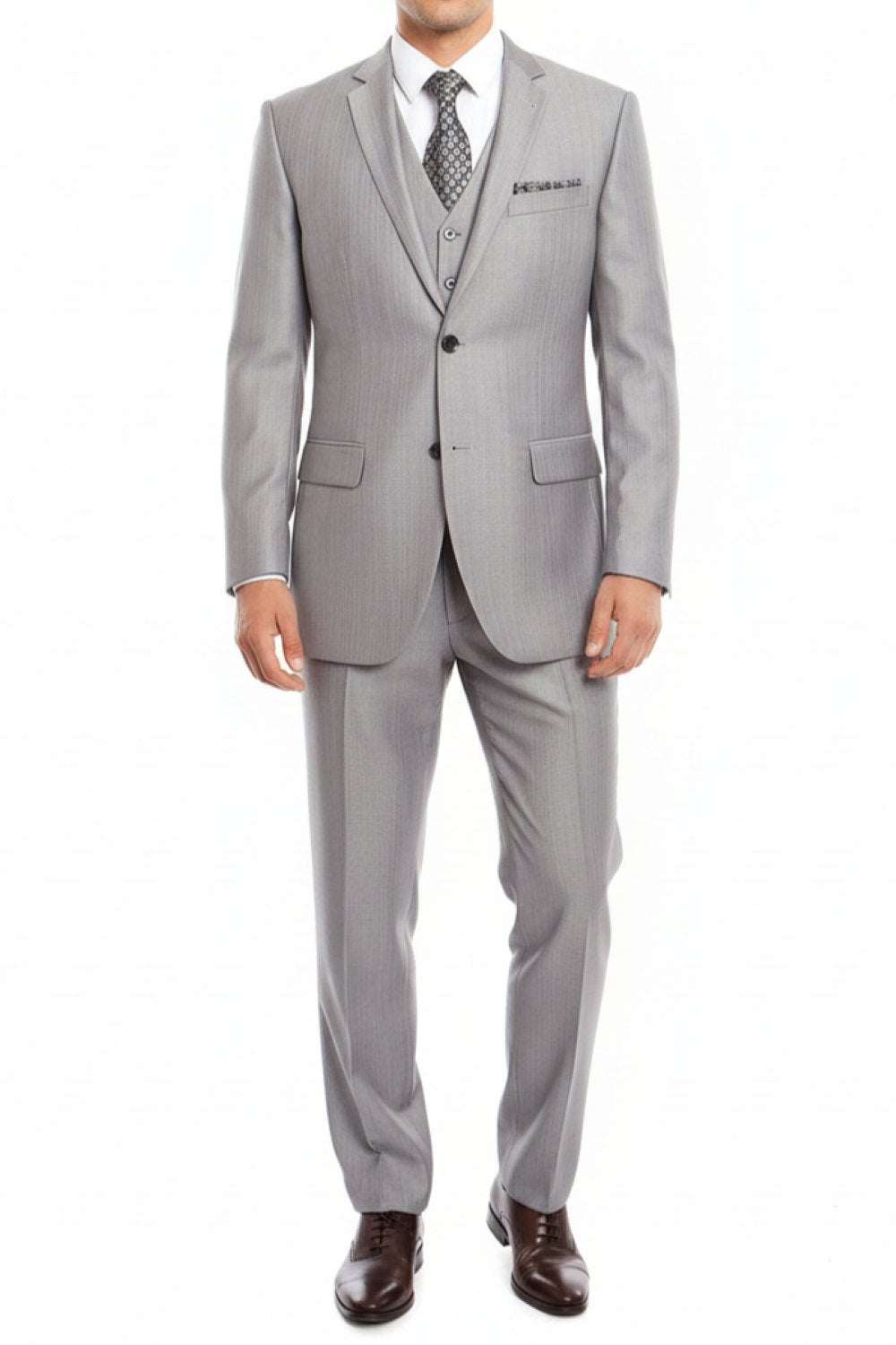 Solid light gray Tazio 3 Piece Modern Fit Suit jacket, showing collar, pocket, and shoes.