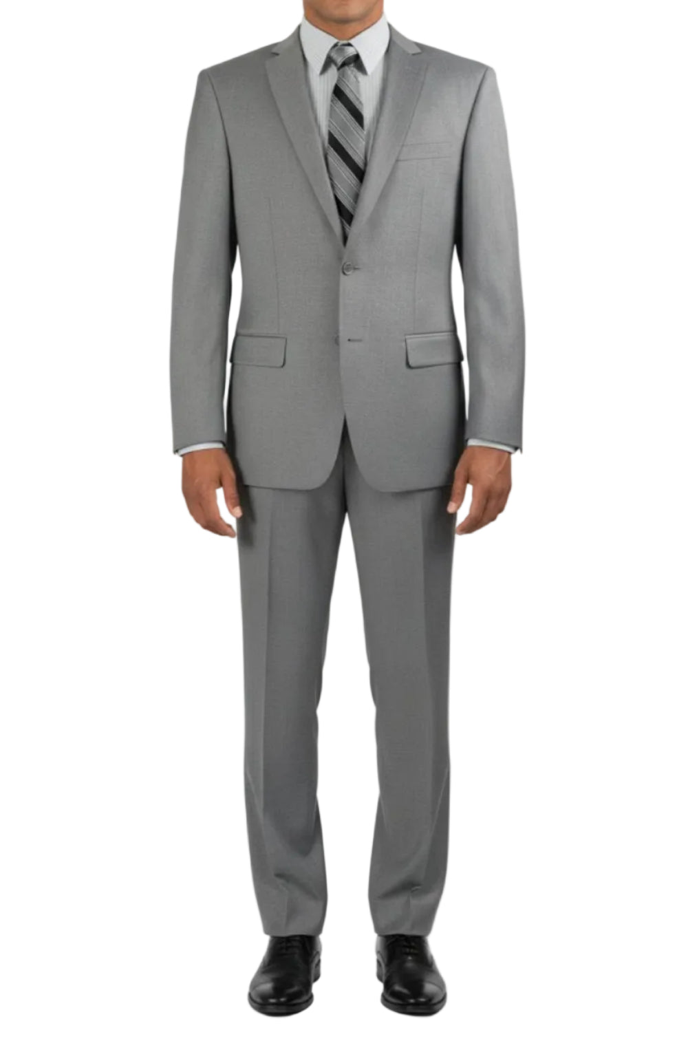 Man wearing a gray suit with a white shirt and black shoes on a white background