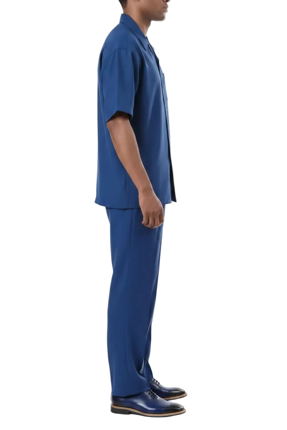 Person wearing a blue outfit on a white background