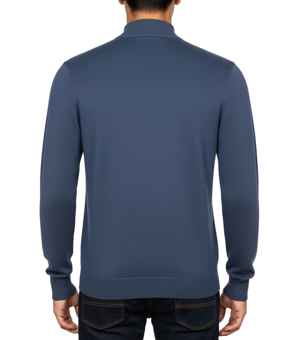 Blue sweater worn by a person on a white background