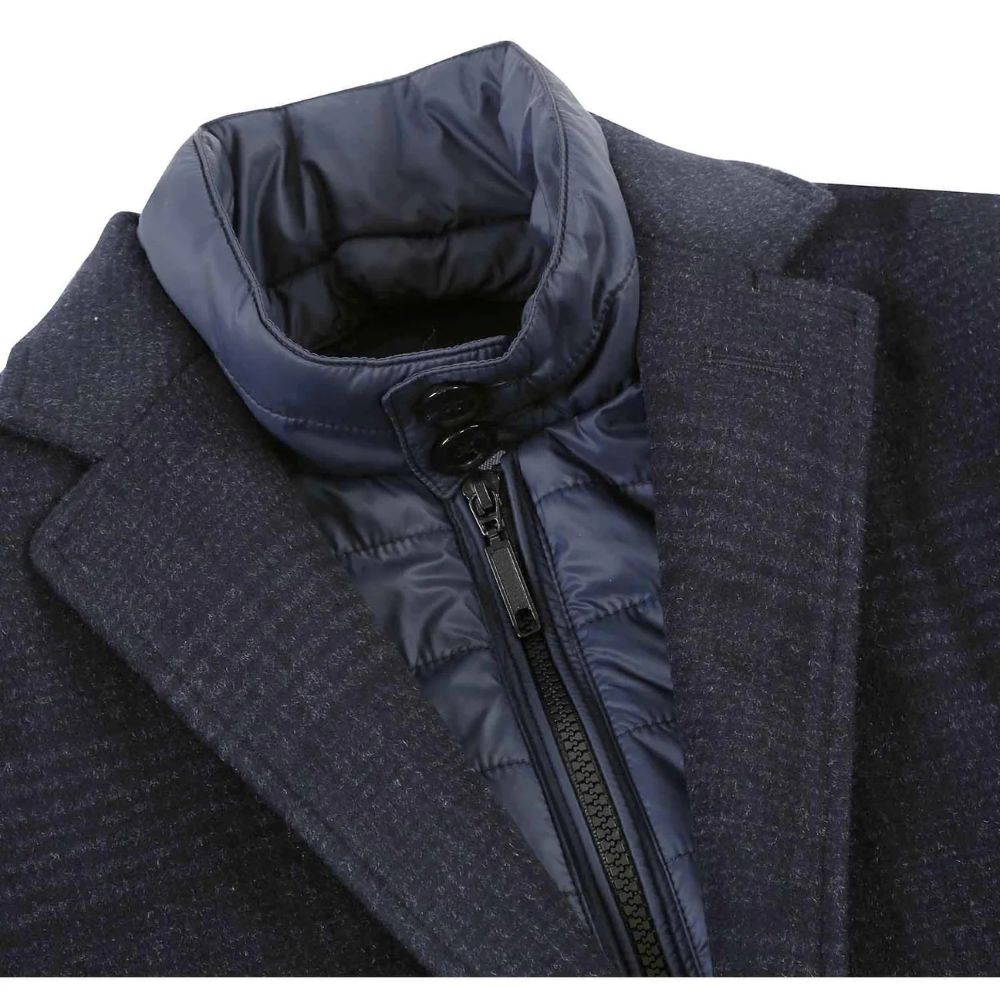 Luxury Renoir dark blue long overcoat detail: exquisite notch lapel and fine fabric craftsmanship.