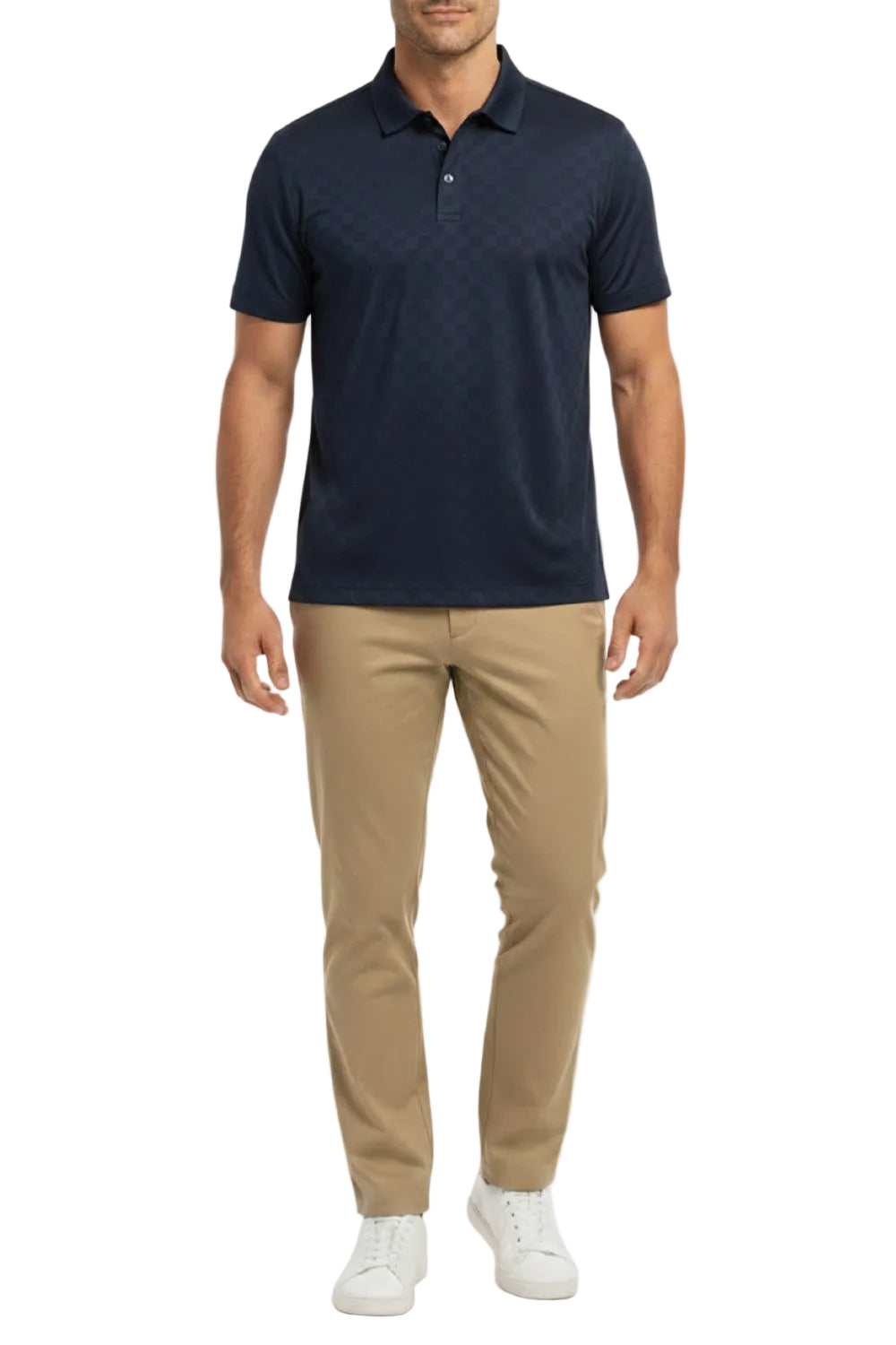Man wearing a navy polo shirt and beige pants on a white background