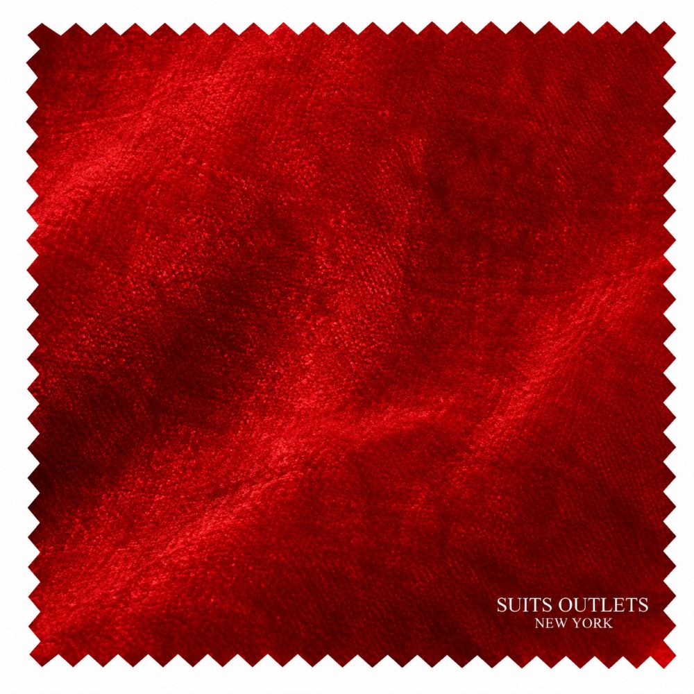 A square red fabric swatch with serrated edges and a visible woven texture, labeled 'SUITS OUTLETS NEW YORK' in the lower right corner.