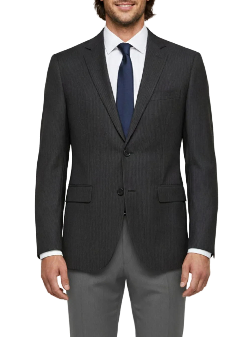 Man wearing a dark gray suit with a blue tie on a light gray background
