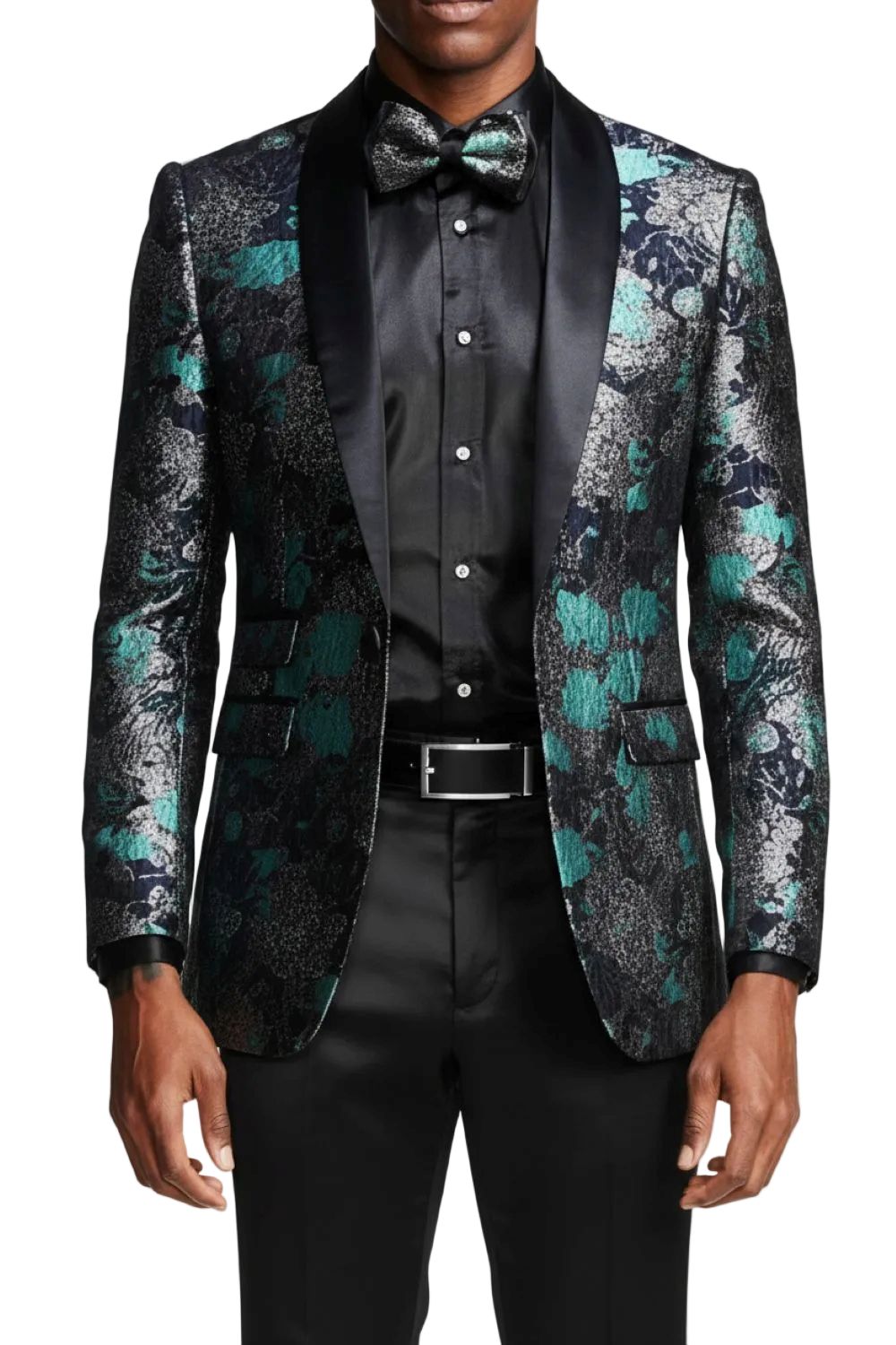 Man wearing a floral patterned jacket over a black shirt and pants on a white background