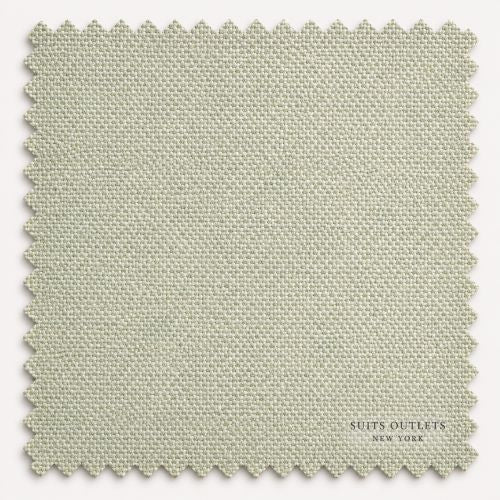 A square fabric swatch with scalloped edges in a light sage green woven material, featuring the text 'SUITS OUTLETS NEW YORK' in the lower right corner, set against a clean white background.