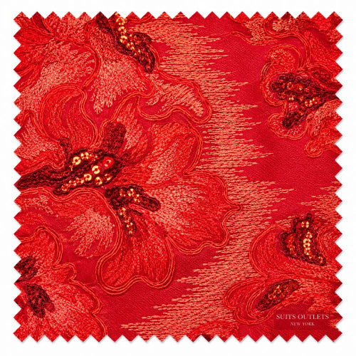 A square fabric swatch with serrated edges showing a rich red and orange floral pattern with sequined details, labeled 'Suits Outlets New York' in the bottom right corner.
