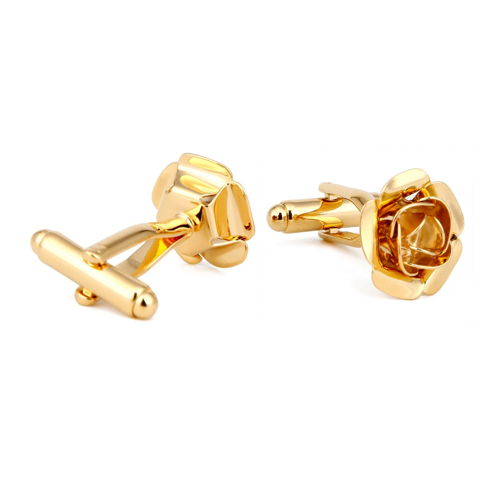 Gold rose-shaped cufflinks on a white background