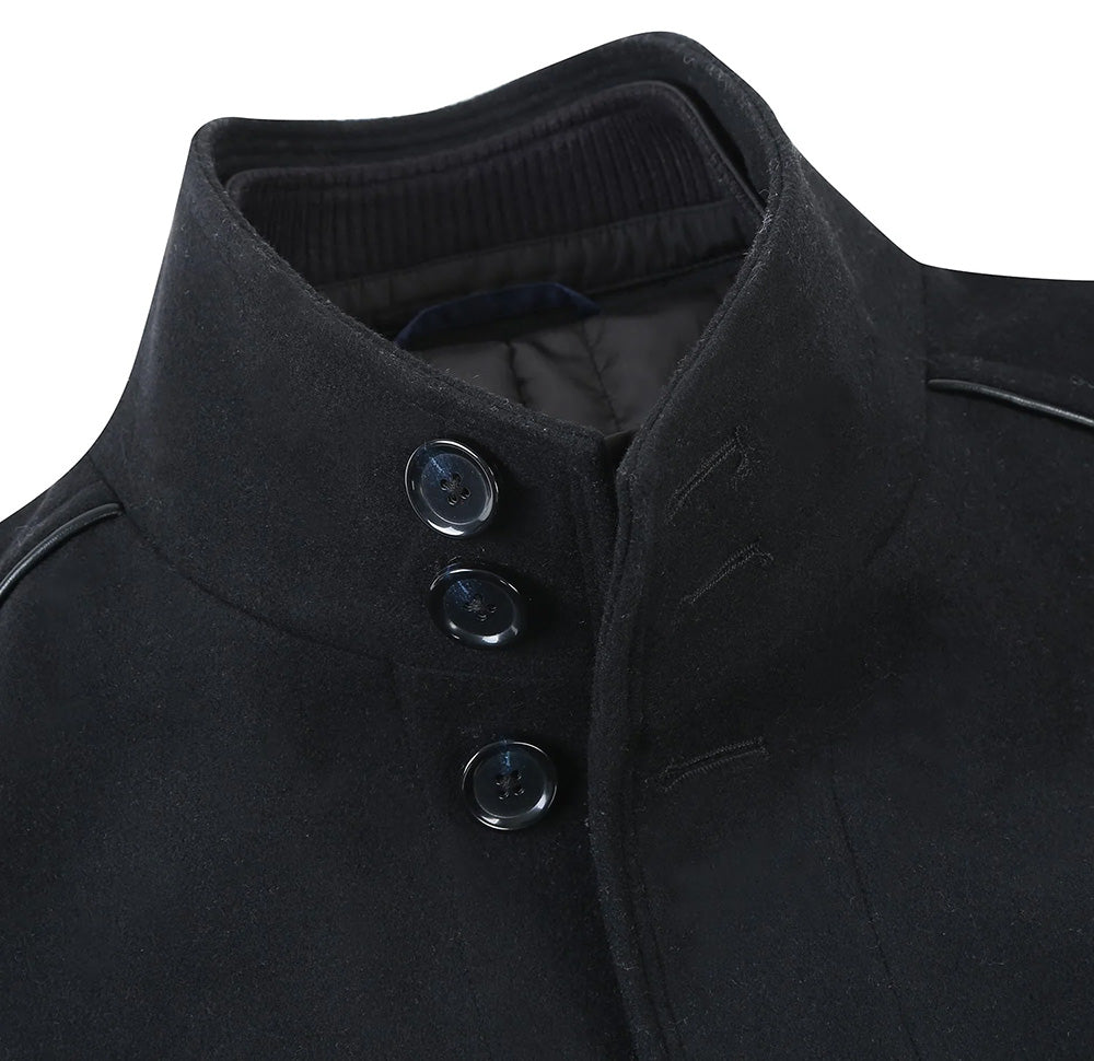 Close-up of the detachable full zipper and fabric on a luxury English Laundry black wool blend short coat.