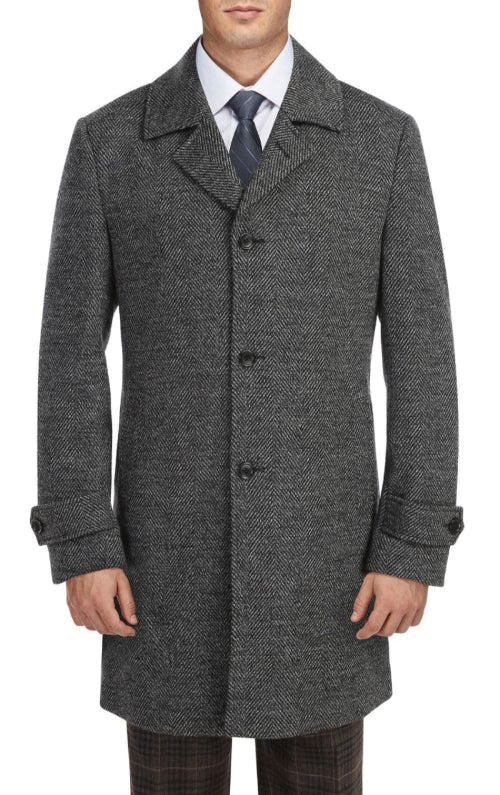 Gray textured overcoat worn by a person on a white background