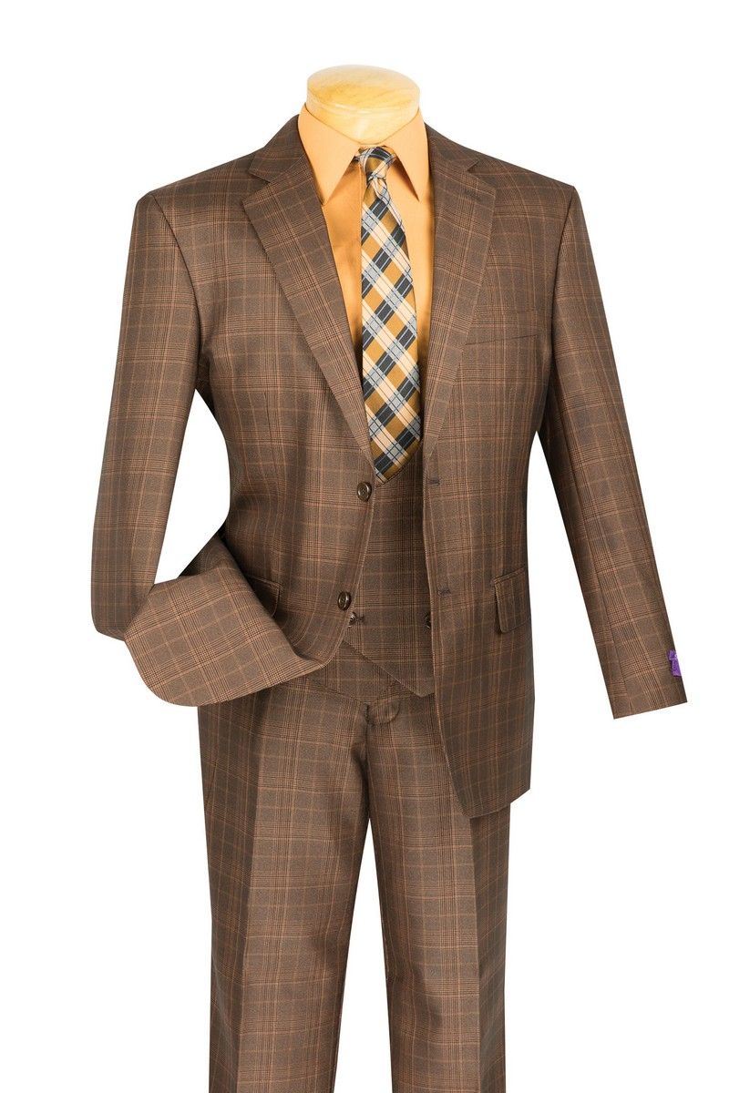 A brown plaid three-piece suit displayed on a mannequin torso, styled with a yellow-orange shirt and a blue, yellow, and brown checkered tie, against a plain white background.