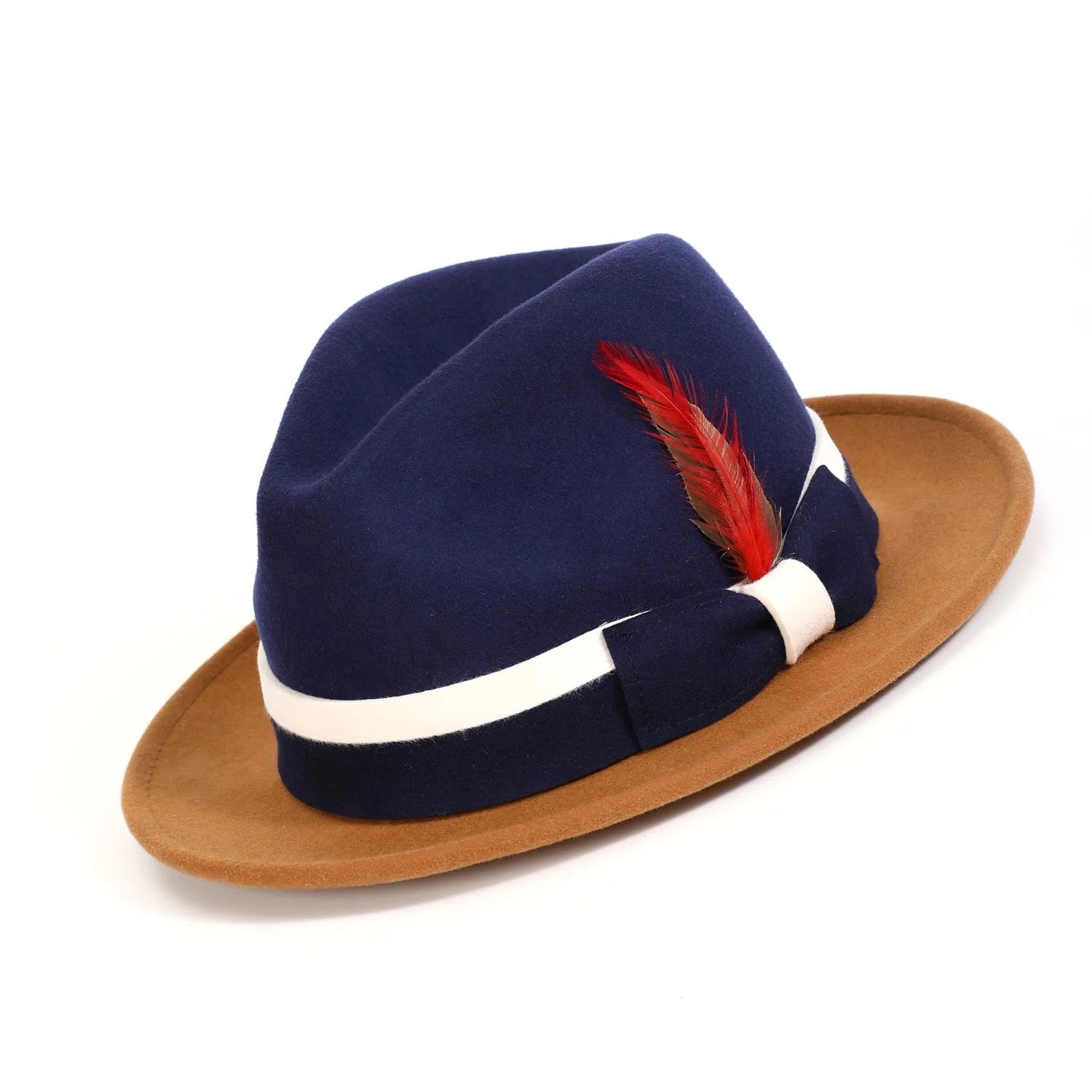 Navy blue fedora hat with a red feather and white band on a white background