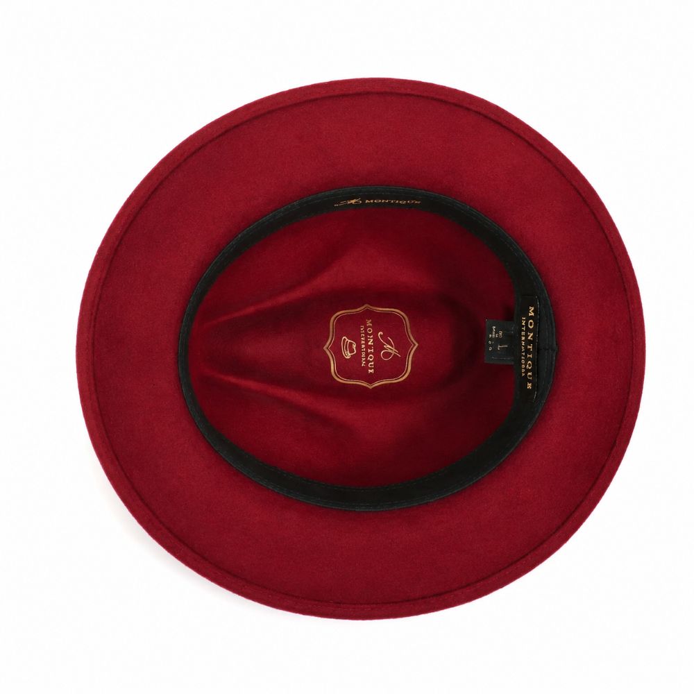 Interior view of burgundy wool felt wide-brim fedora with black sweatband and gold logo