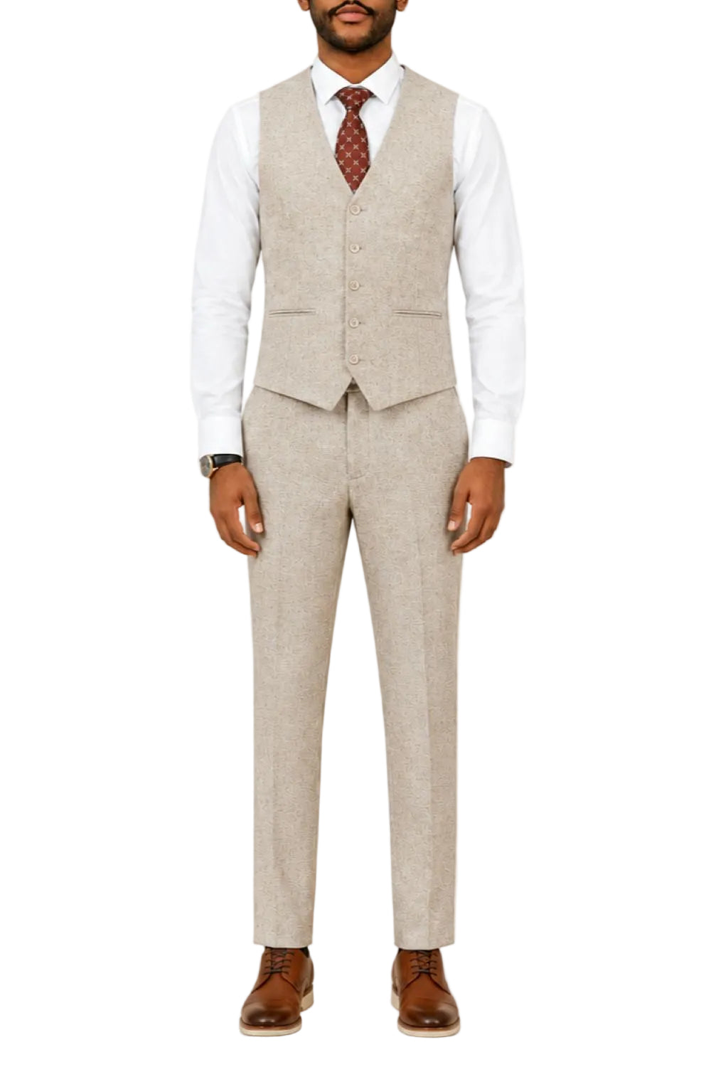 Man wearing a beige suit vest and pants with a white shirt and brown tie on a white background