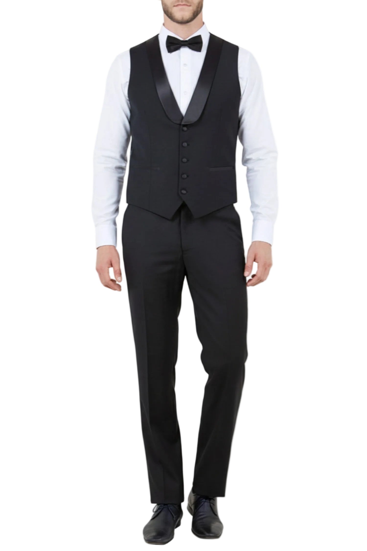 Man wearing a black tuxedo with a white shirt and bow tie on a white background