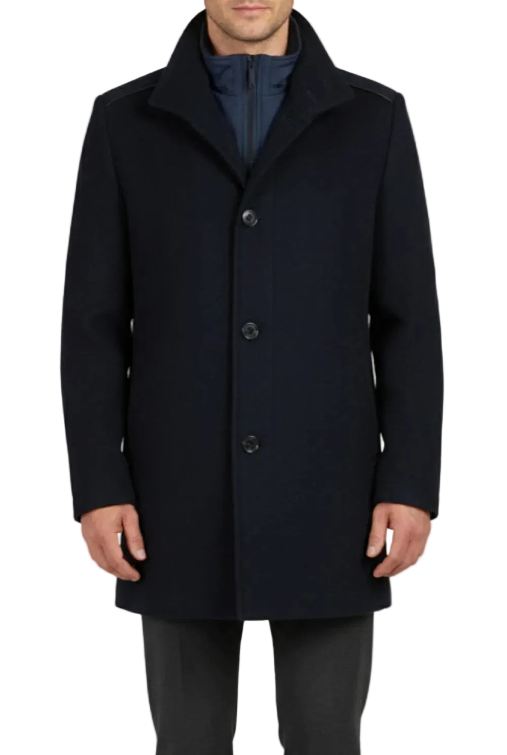 Man wearing a dark blue coat on a light gray background