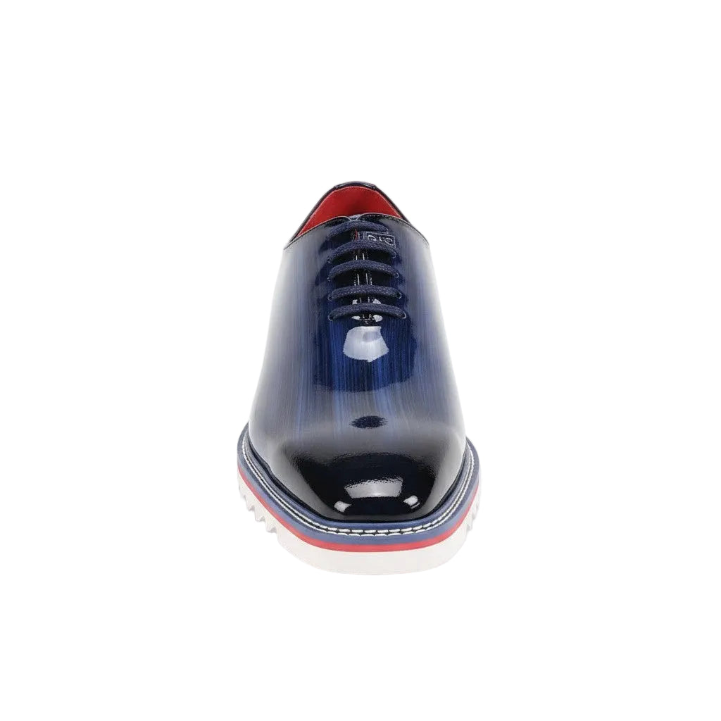 Cobalt shoe with red and white accents on a white background