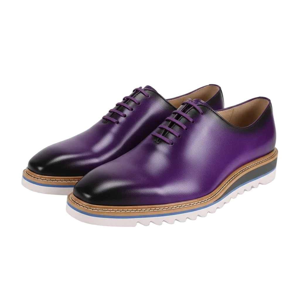Purple leather shoes with black toes and brown soles on a white background