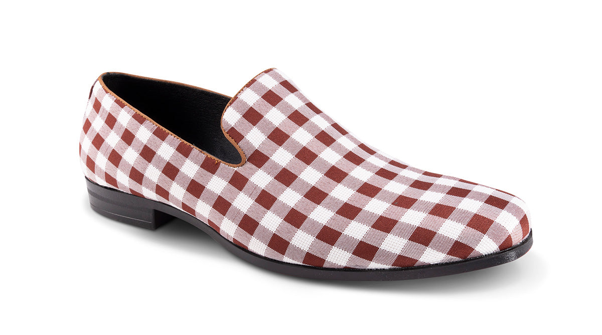 A pair of Montique Brick Checkered Printed Loafer shoes, with a brick-colored checkered pattern on the upper.