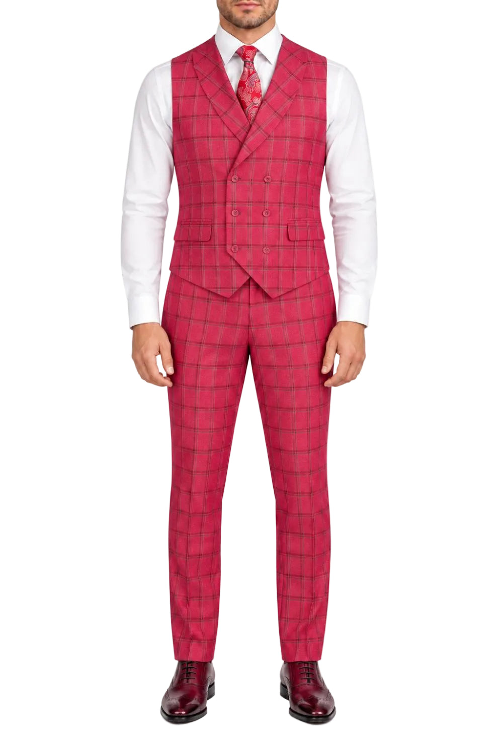 A man wearing a bright pink and red plaid three-piece suit with a double-breasted vest, matching trousers, a white dress shirt, and a red patterned tie, standing against a plain white background.