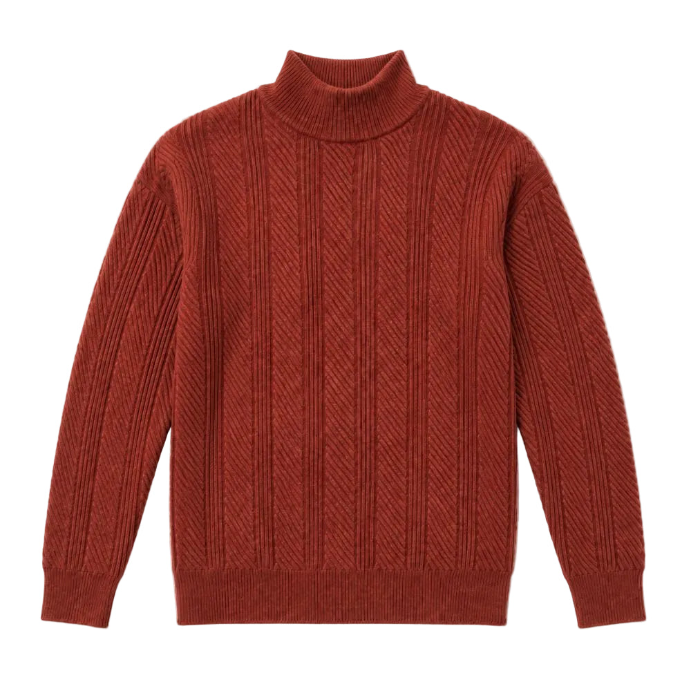 A rust-colored ribbed knit turtleneck sweater with a textured chevron pattern on the chest, displayed flat against a solid white background.