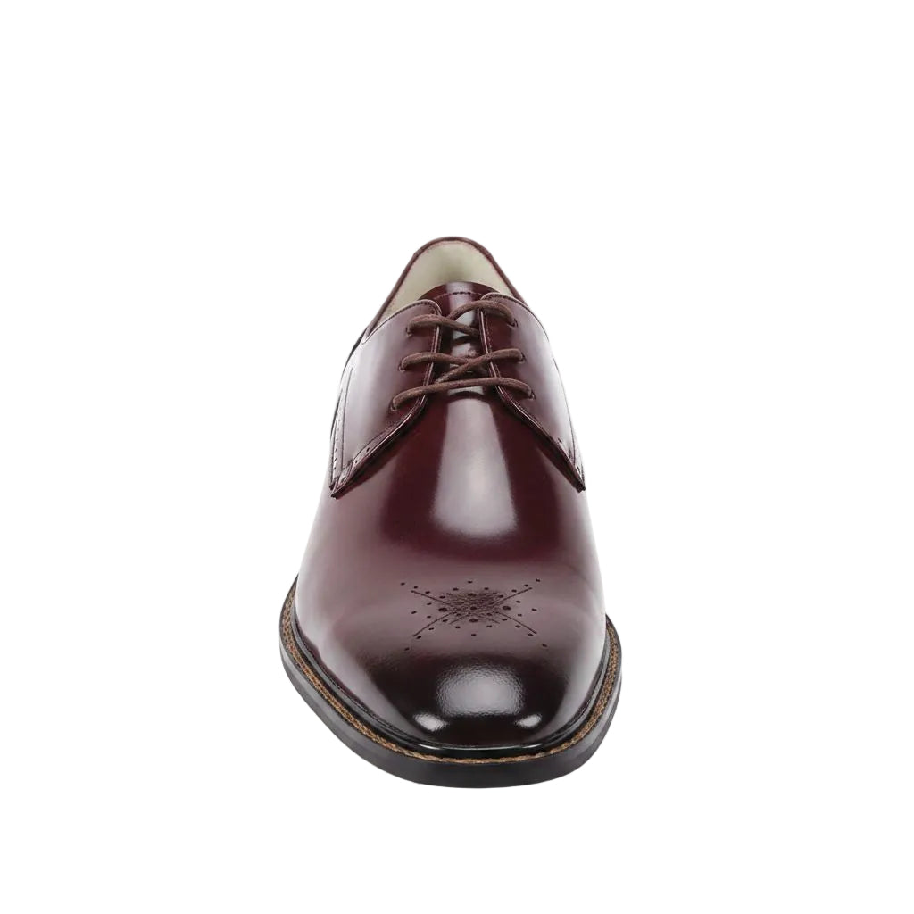 Burgundy leather dress shoe on a white background