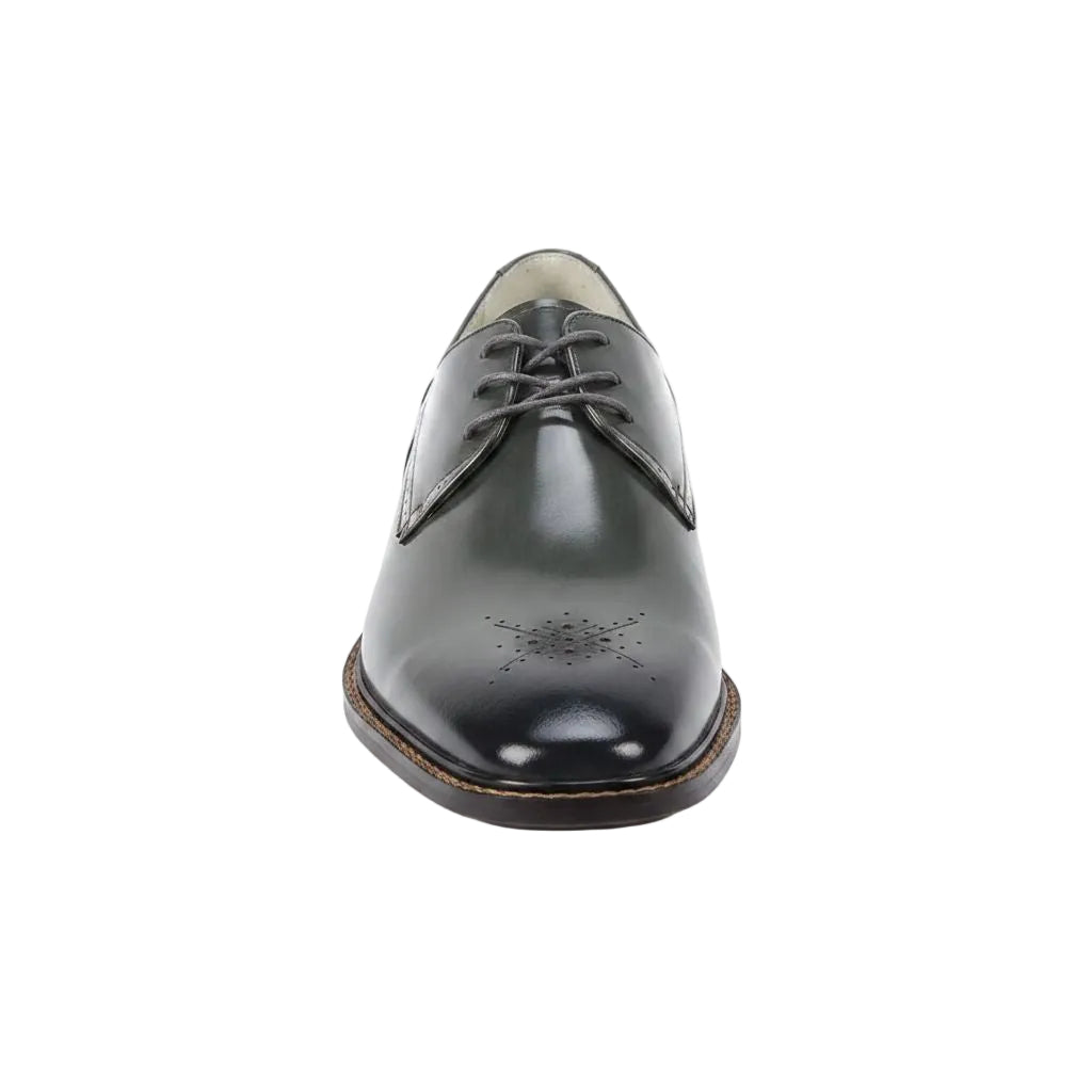Black leather dress shoe on a white background