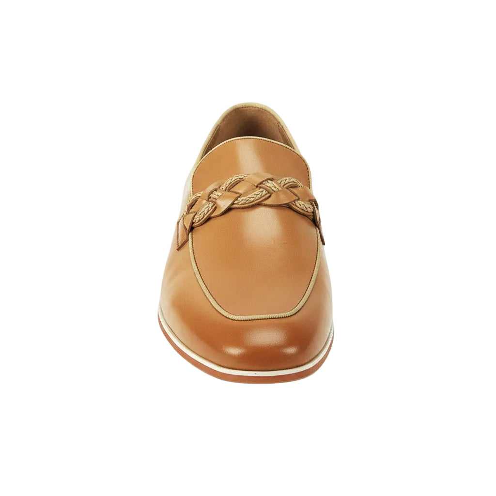 Tan leather loafer with braided detail on a white background