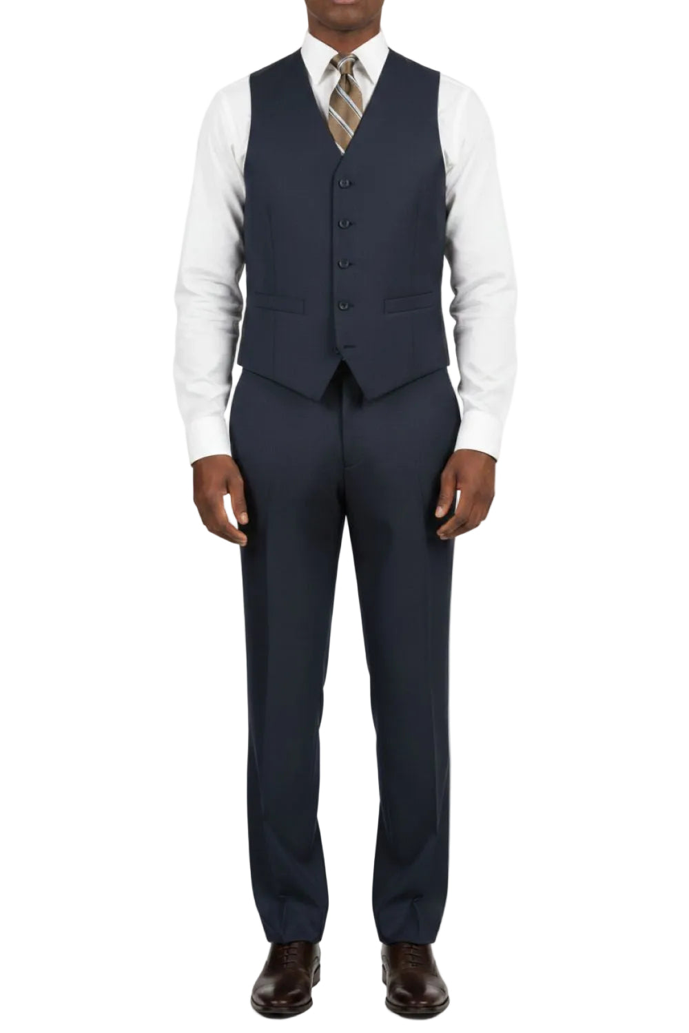 Man wearing a navy suit with a white shirt and tie on a white background