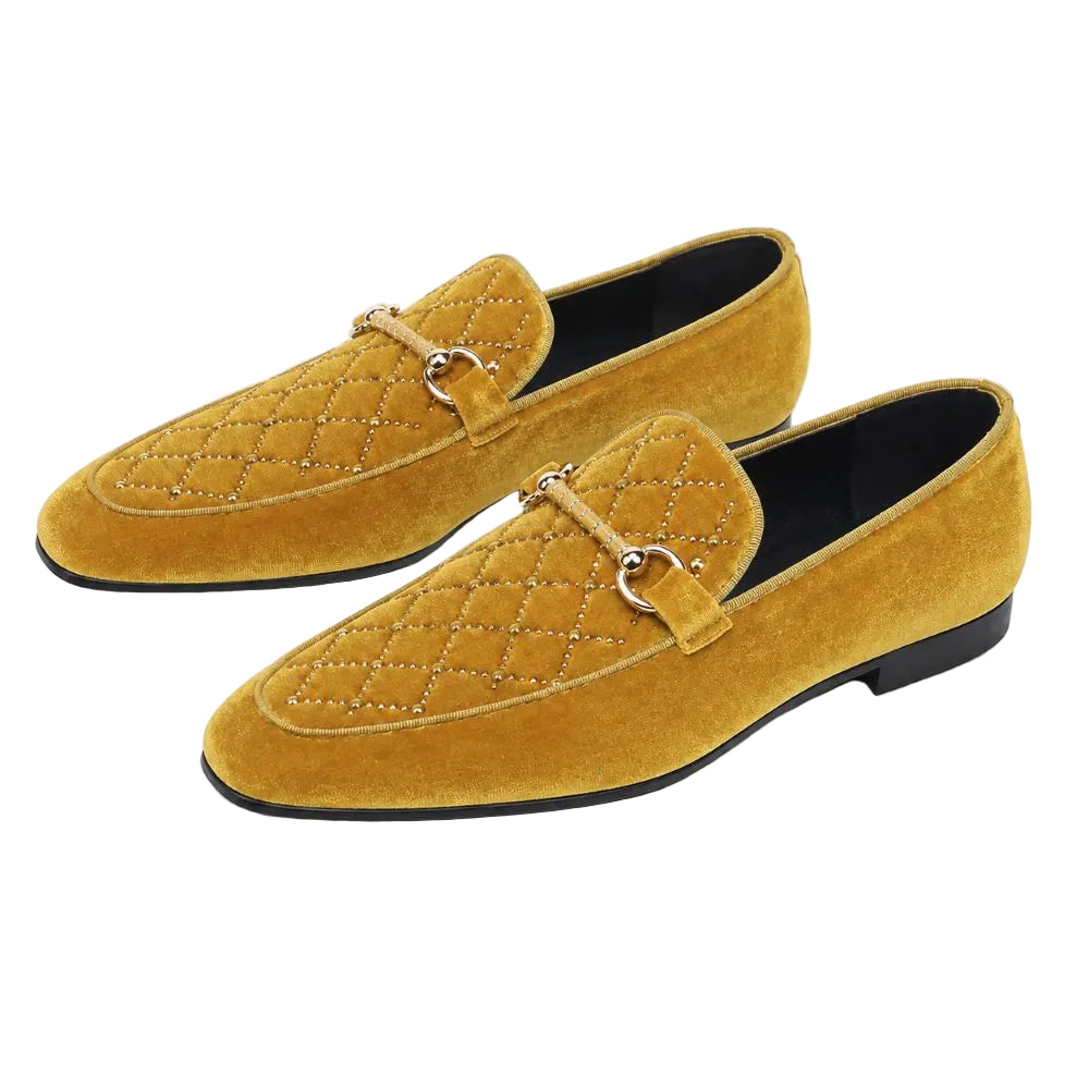 A pair of men's yellow suede loafers with quilted diamond stitching, a gold-tone horsebit detail, and black soles, shown on a white background.