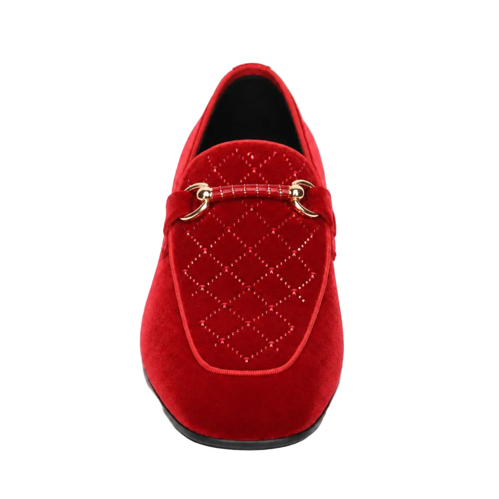 A red velvet slip-on loafer with a quilted diamond pattern on the side and gold-tone horsebit hardware across the vamp, shown from a top-down view on a white background.