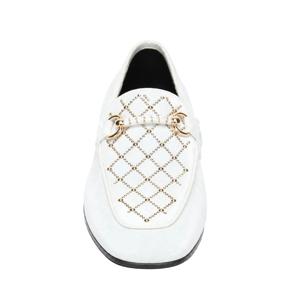 A white leather loafer featuring a quilted diamond pattern on the vamp with gold-tone studs and a matching gold-tone bow detail across the instep, set against a plain white background.