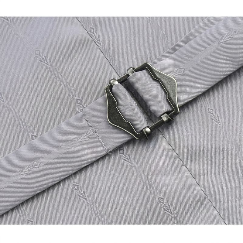 Close-up of a light gray fabric belt with a textured woven pattern and a dark metallic buckle, laid diagonally across a matching gray fabric background.