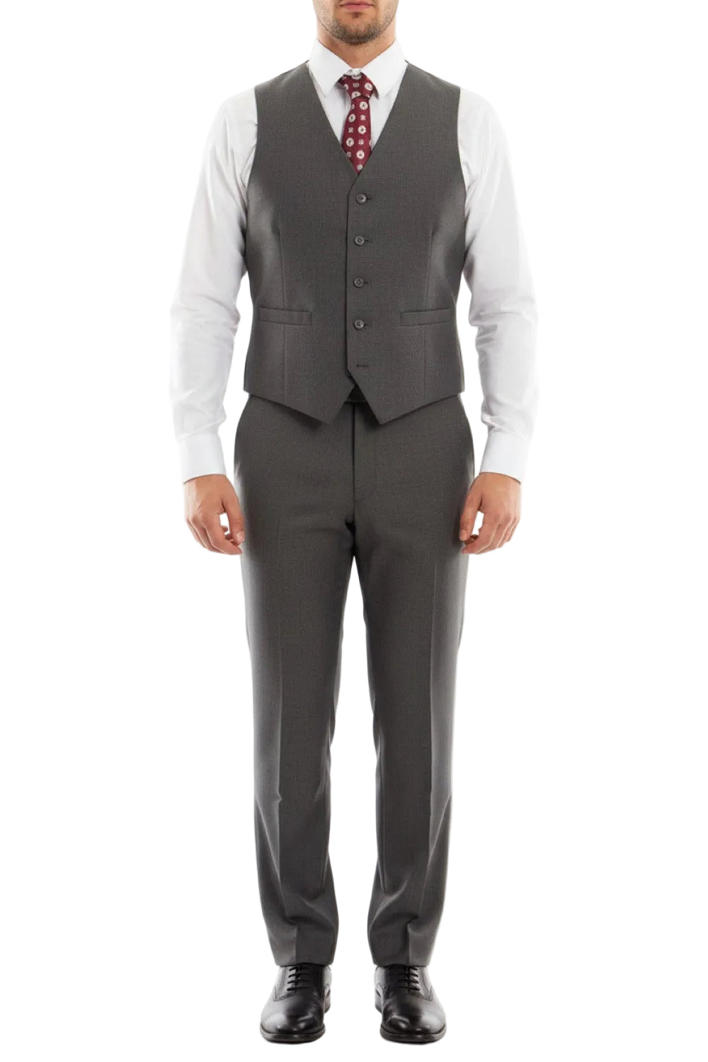 Dark gray suit with a vest and red patterned tie on a white background