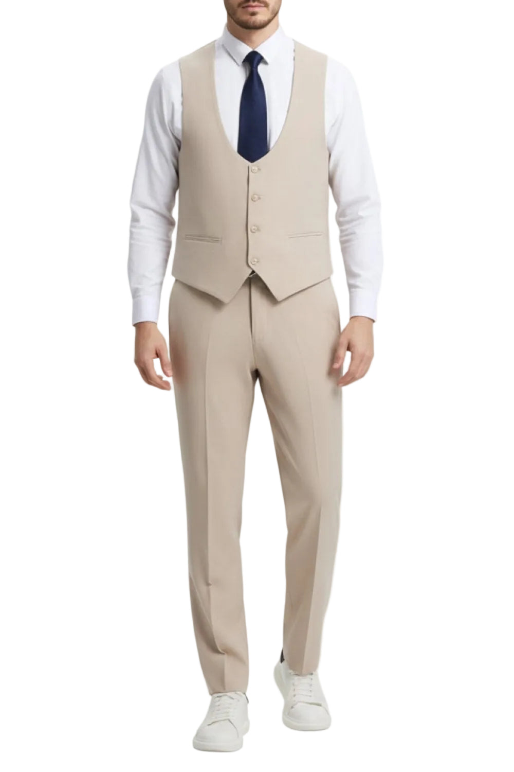 Man wearing a tan suit vest and pants with a white shirt and blue tie on a white background