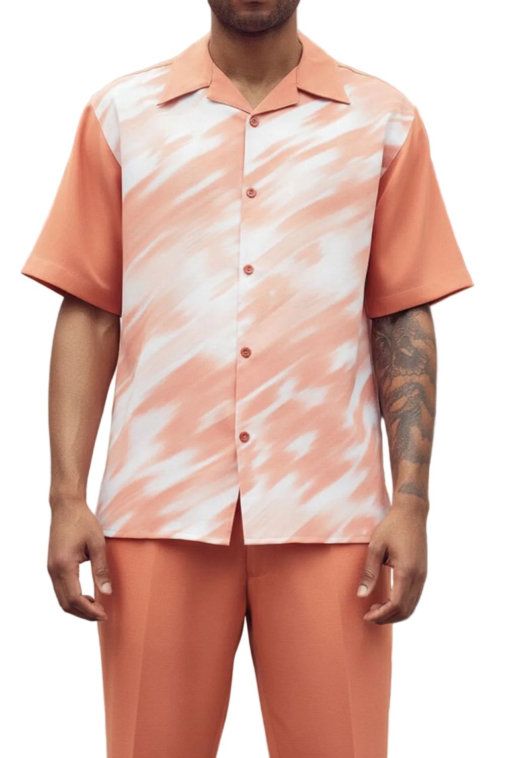Person wearing a peach and white patterned shirt with matching pants on a white background
