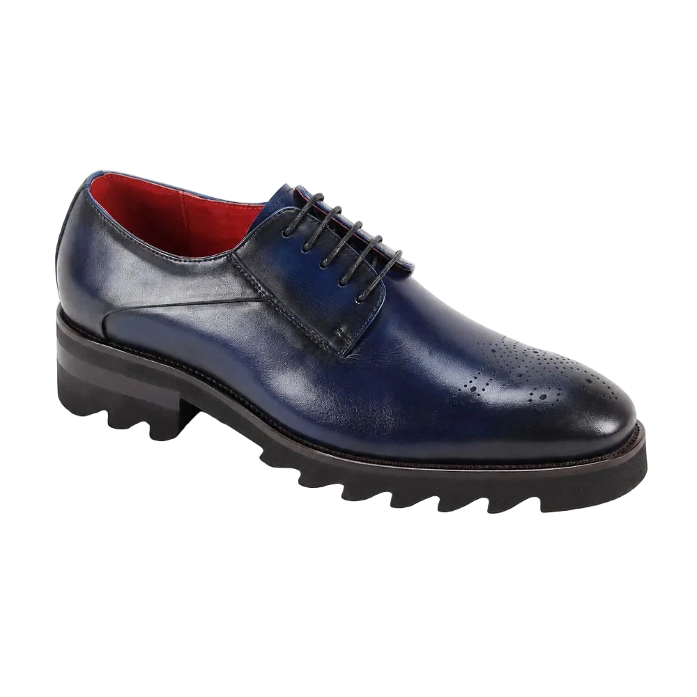 A navy blue leather lace-up dress shoe with a black lug sole and a red interior lining, shown from a three-quarters angle on a white background.