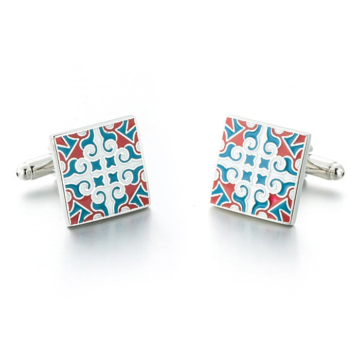 Pair of square cufflinks with a colorful pattern on a white background